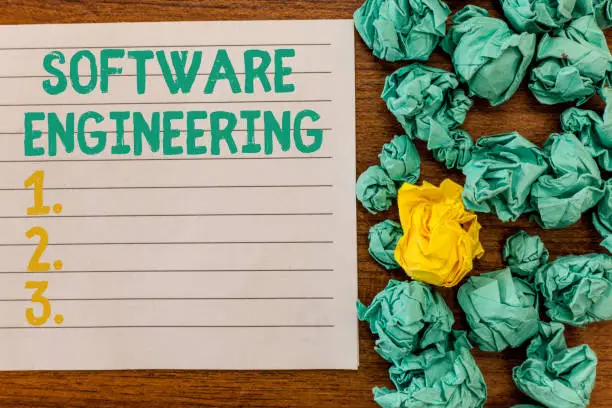 Photo of Writing note showing Software Engineering. Business photo showcasing Program Development in Systematic Quantifiable approach