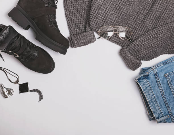 istock Feminine autumn or winter outfit on white bakcground 1049740848