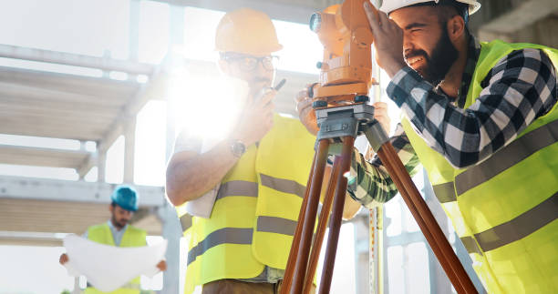 istock Portrait of construction engineers working on building site 1049742310
