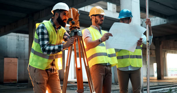 istock Portrait of construction engineers working on building site 1049742390
