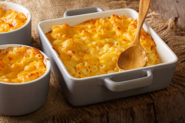 istock Homemade casserole mac and cheese in a baking dish close-up. horizontal 1049746382