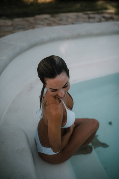 istock Woman in swimming pool 1049751822