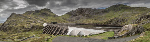 istock Stwlan Dam and the Moelwyn mountains. 1049755050