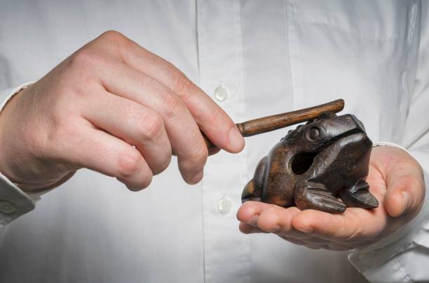 Prosperity Money Lucky Feng Shui Frog in businessman`s hands. Good fortune, wealth and prosperity concept. chinese frog stock pictures, royalty-free photos & images
