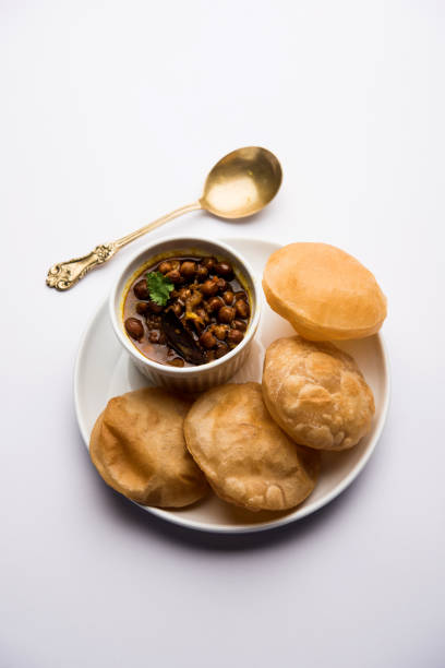 istock Chole puri or chana masala with fried poori 1049758478
