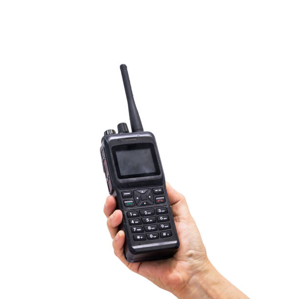 Hand holding Walkie talkie isolated on white