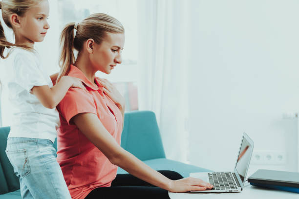 istock Daughter Is Making Back Spine Massage To Mum. 1049775104