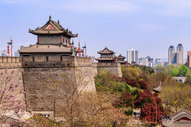 Listed historical city wall of the old imperial city of Xi'an The fortification from the 14th century is one of the best preserved fortesses in China circa 14th century photos stock pictures, royalty-free photos & images