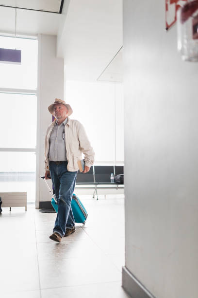 istock Senior Man Traveling 1049778496
