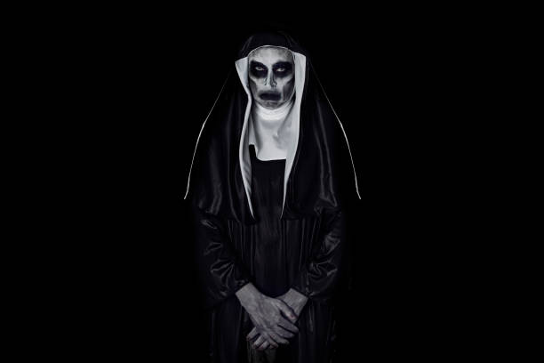 portrait of a frightening evil nun - bad habit imagens e fotografias de stock