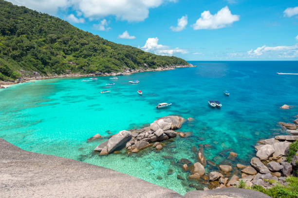 istock Rocks , sea and blue sky 1049791570