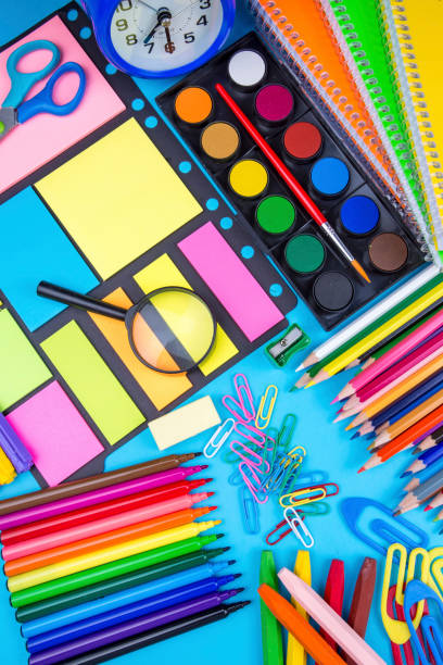 istock School and office equipment, stationery on the background 1049791924