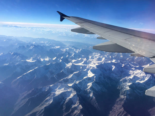 These pictures are taken from New Delhi to Almaty flight over Himalayan mountain range.