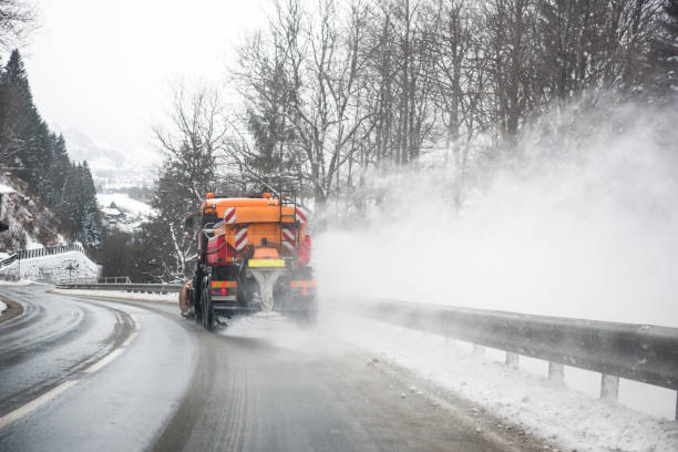 istock Snowplow removing snow from the road 1049802074