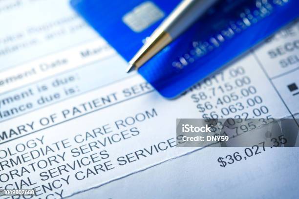 Credit Card On A Hospital Invoice Stock Photo - Download Image Now - Healthcare And Medicine, Financial Bill, Debt