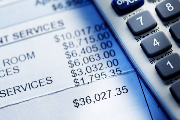 istock Calculator Resting On Top Of An Invoice 1049808846