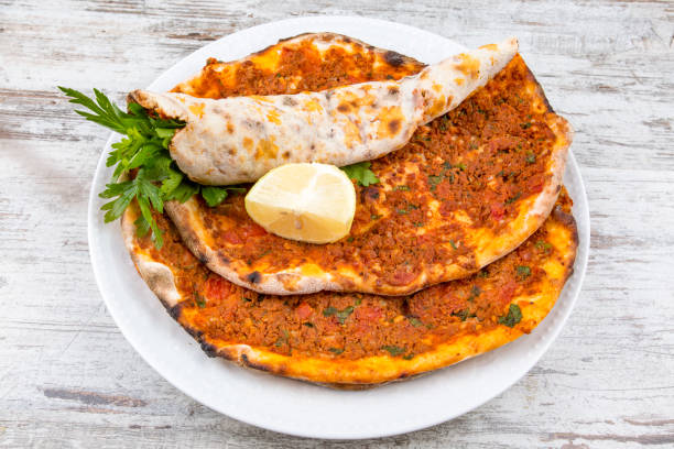 istock Traditional Turkish Foods; Turkish pita pizza (Lahmacun) 1049810986
