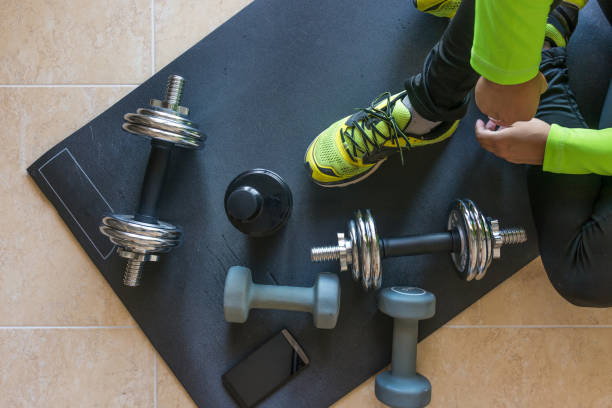 istock Dumbbell and mat training at home, 1049812474