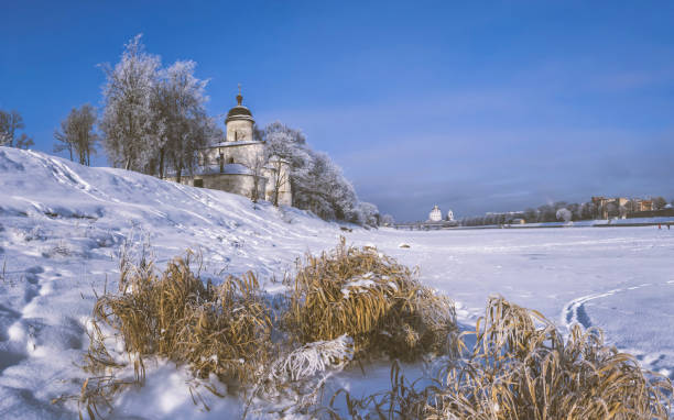 istock Orthodox church near by river 1049816294