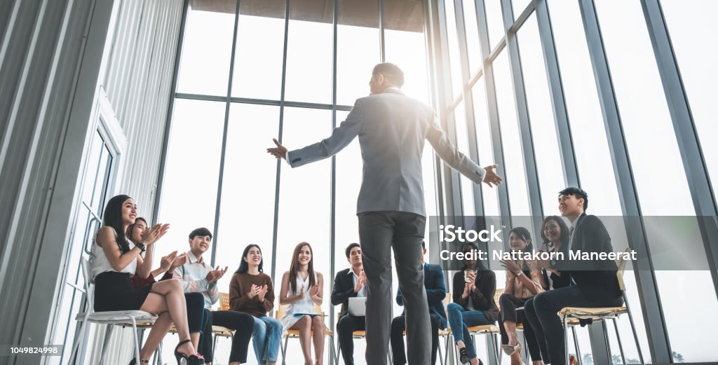Business people clapping hands during meeting in office for their success in business work Manager Stock Photo