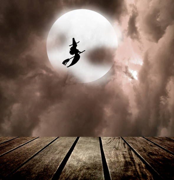istock Full Moon Night and Witch Silhouette 1049829226