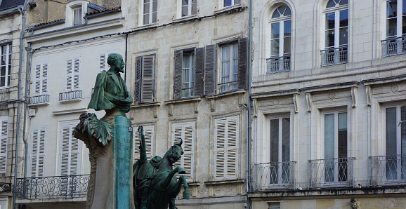 Eugene Fromentin Monument in La Rochelle, France. The statue was created in 1905 by Ernest Henri Dubois to commemorate the life of Eugene Fromentin (1820-1876), a French painter and writer.