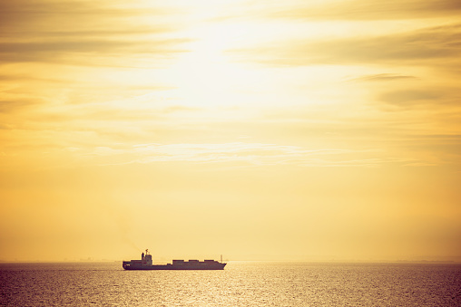 Freight vessel in the sunset