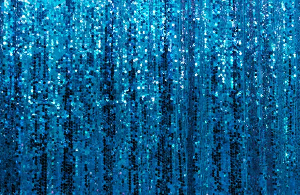 Photo of Beautiful blue glitter Sparkling sequined curtain background