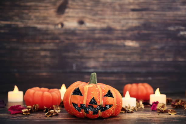 istock Halloween decoration on wooden background 1049836984