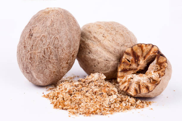 istock Nutmeg spice isolated on the white background 1049840228