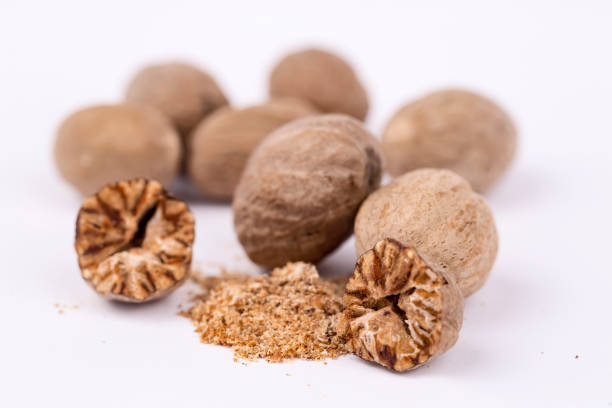 istock Nutmeg spice isolated on the white background 1049840592