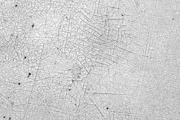 istock Crack and damage on painted texture in black and white. 1049841332