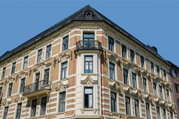 istock low angle view of beautiful old building with balconies and decorative elements against blue sky, oslo, norway 1049844386
