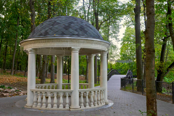 3D illustration of a summer gazebo with marble steps and a tiled roof isolated on a white background.