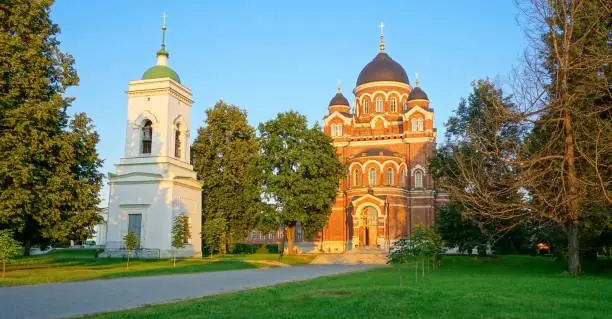 Bell tower and Cathedral of the Spaso-Borodino monastery in the sunset