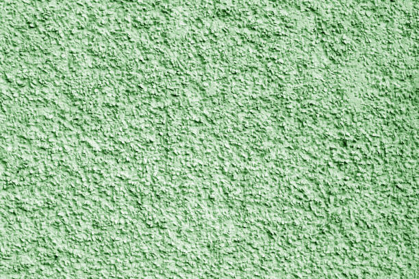 istock Concrete wall background in green color. 1049857090