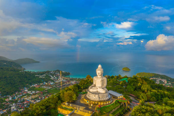istock amazing rainbow cover Phuket big Buddha 1049867742