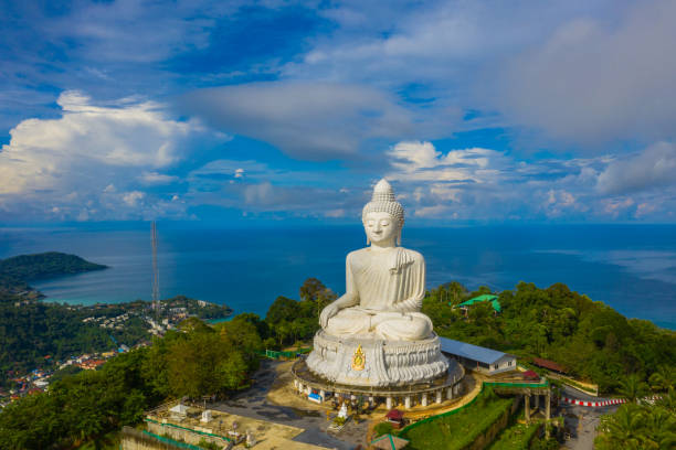 istock areial view white cloud in blue sky at Phuket big Buddha. 1049869338