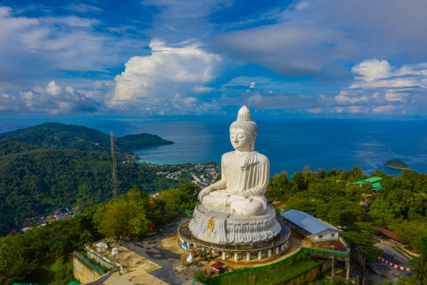 istock areial view white cloud in blue sky at Phuket big Buddha. 1049869352