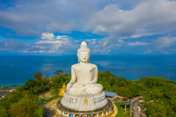 istock areial view white cloud in blue sky at Phuket big Buddha. 1049869358