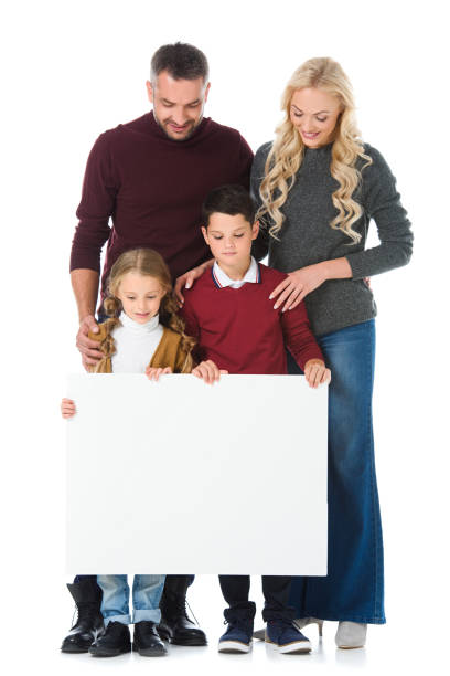 istock parents and kids holding empty board, isolated on white 1049870134