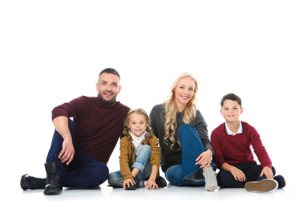 istock parents sitting together with kids, isolated on white 1049870170