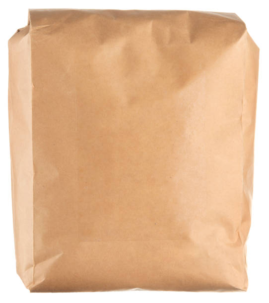 istock Closed craft paper food coffee package isolated on white background 1049873982