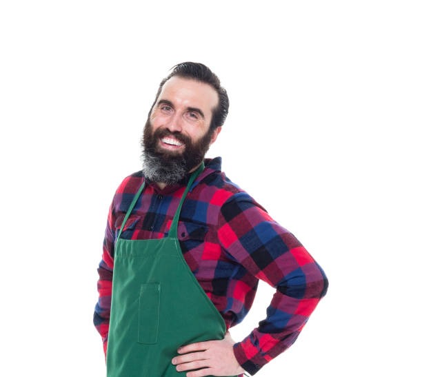 istock Man wearing green apron 1049880390