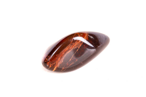 istock Macro mineral stone jasper on a white background 1049883608