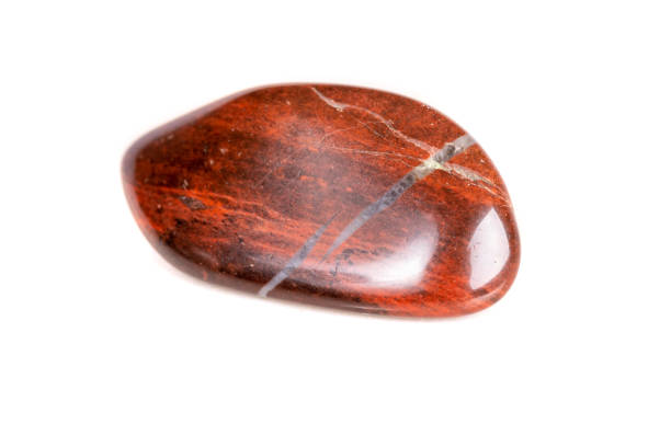 istock Macro mineral stone jasper on a white background 1049883654