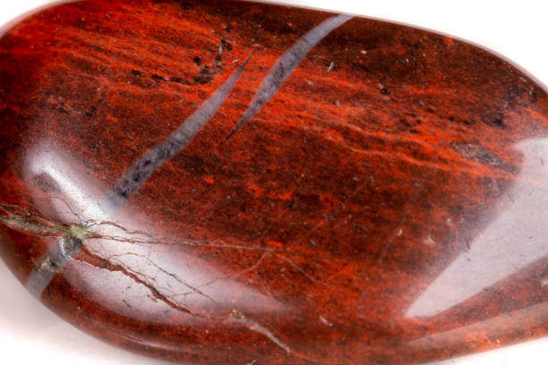 istock Macro mineral stone jasper on a white background 1049883984