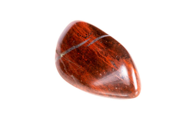 istock Macro mineral stone jasper on a white background 1049884086