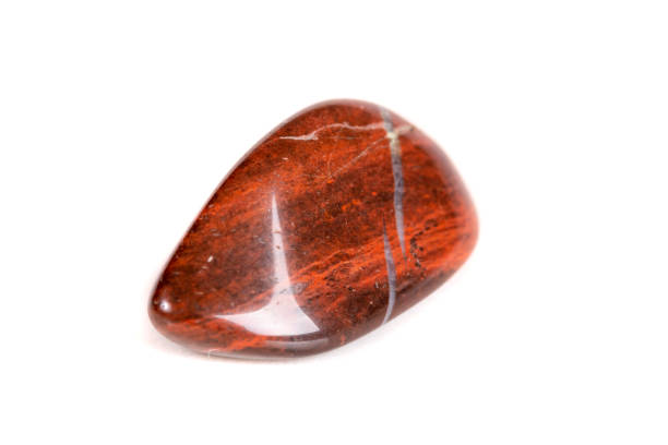 istock Macro mineral stone jasper on a white background 1049884210