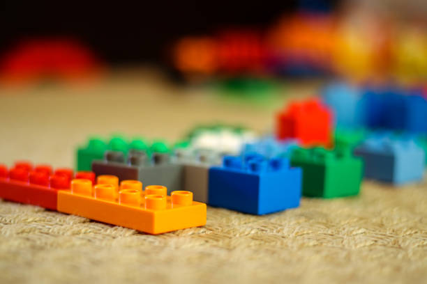 istock Plastic toy building blocks with defocused background 1049884428